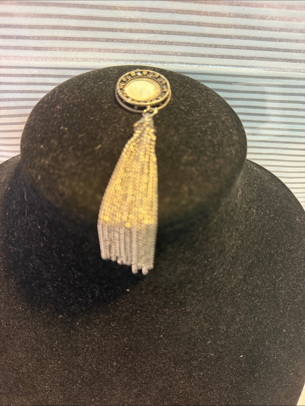 Source Unknown Gold Tassel Pendant with Textured Medallion